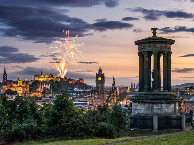 Edinburgh skyline with firework in distance