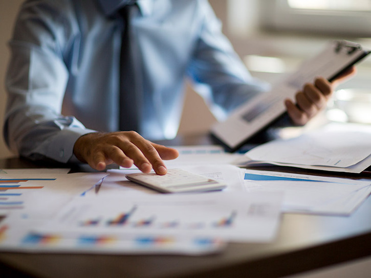 business man looking at paperwork