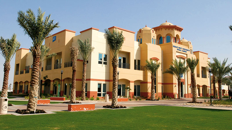 the first heriot-watt campus with tan color and a simplified arabic architectural design