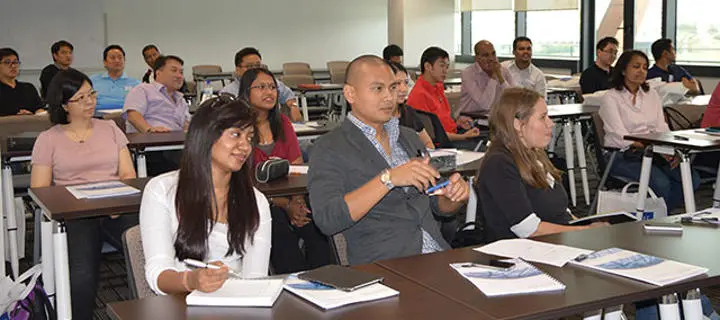 Group of students seated in a teaching classroom