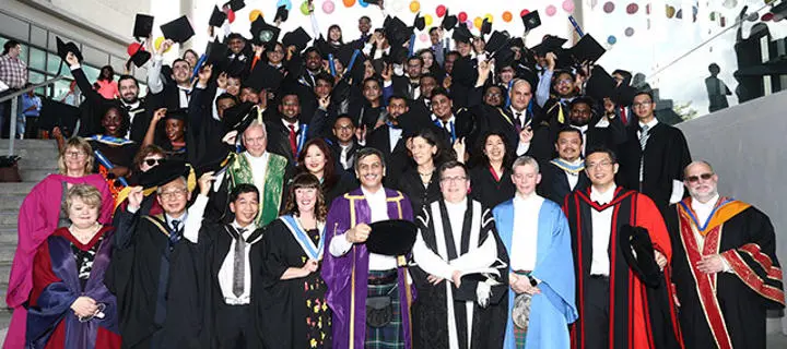 group shot of undergraduate's at the first graduation ceremony