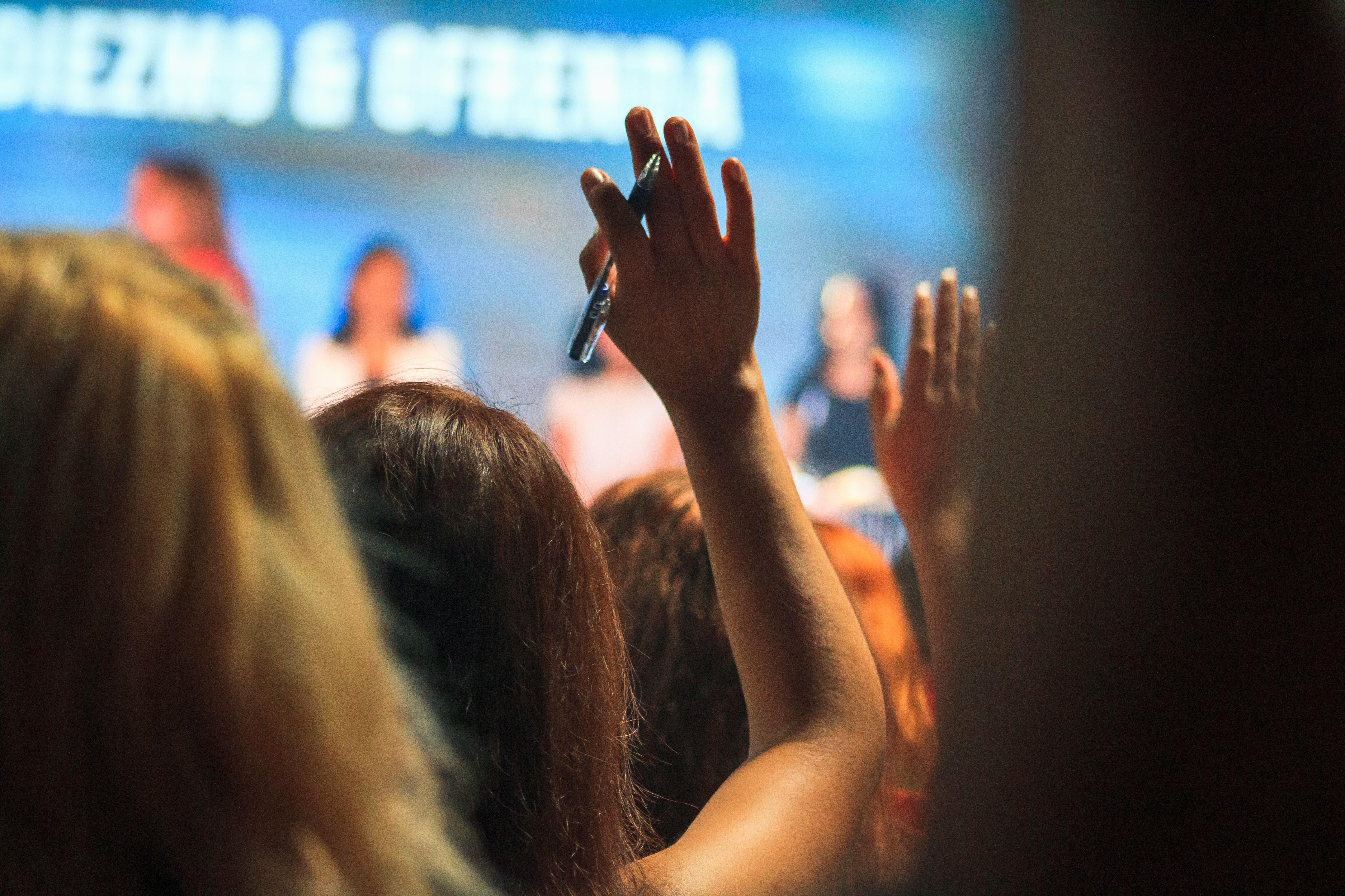 Close up of a crowd of people at a live event