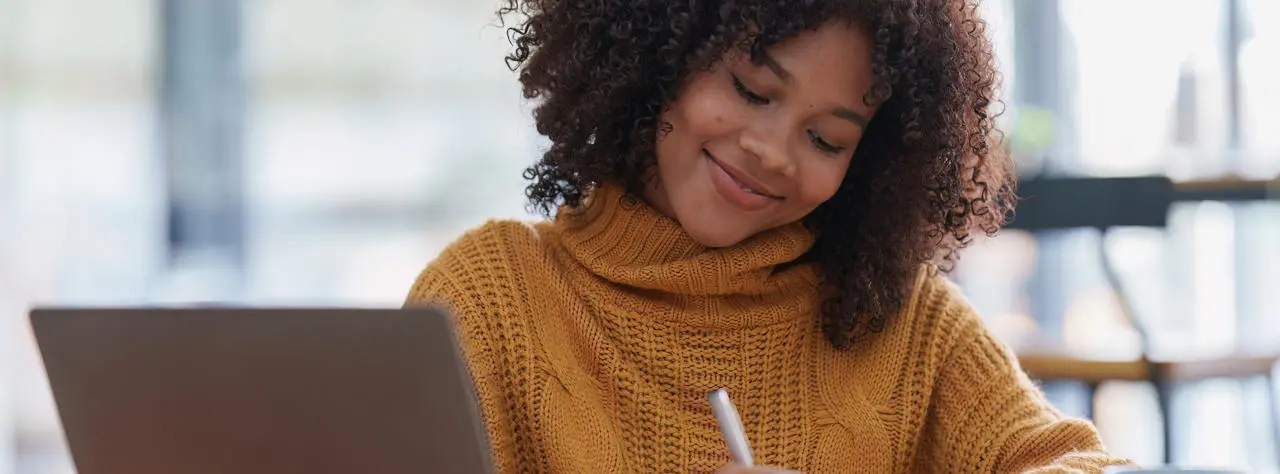 Female student working on laptop
