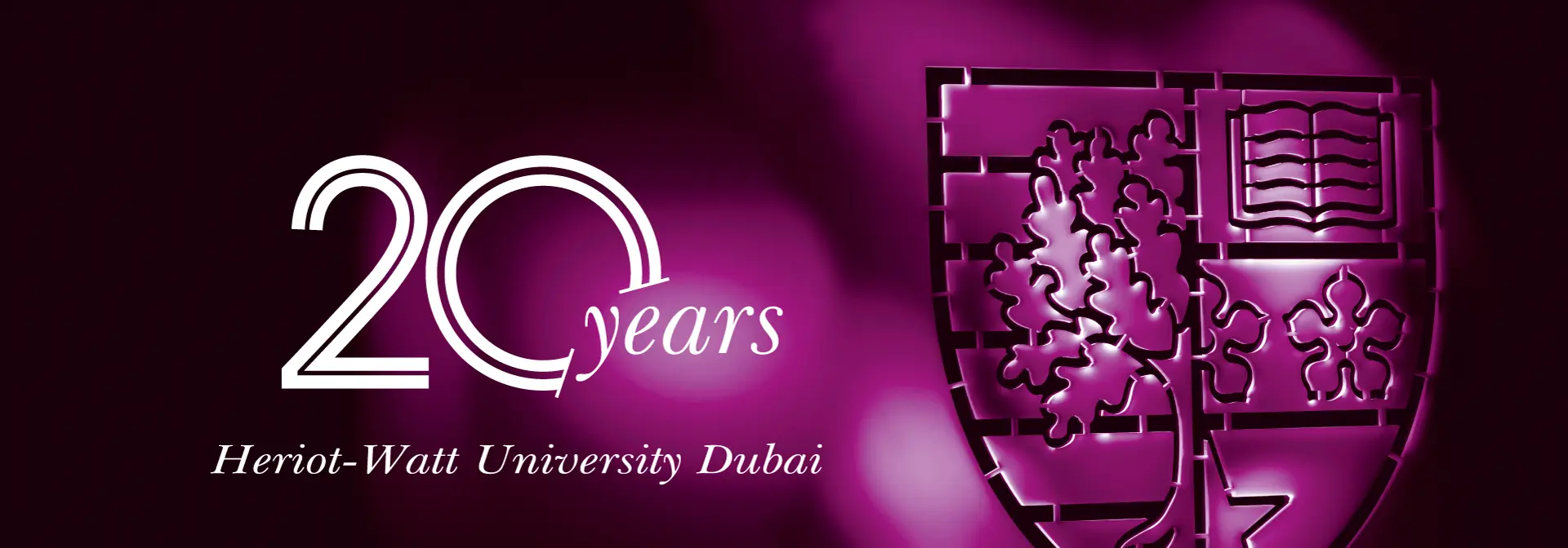 20 Years of Heriot-watt university written in graphics next to the university shield