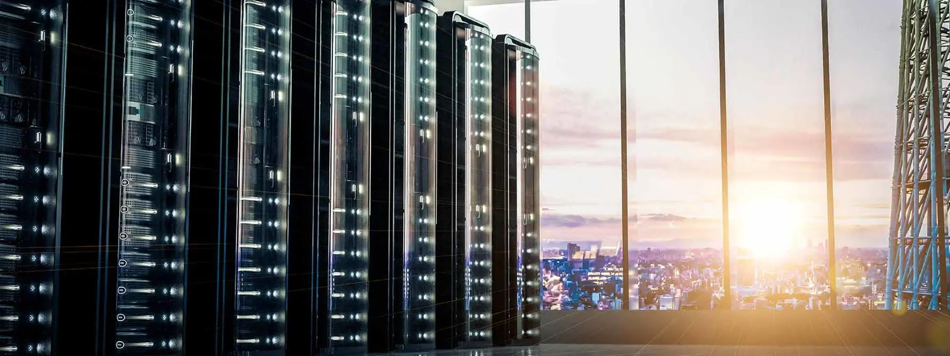 A data centre with rows of servers and the sun shining through a window.