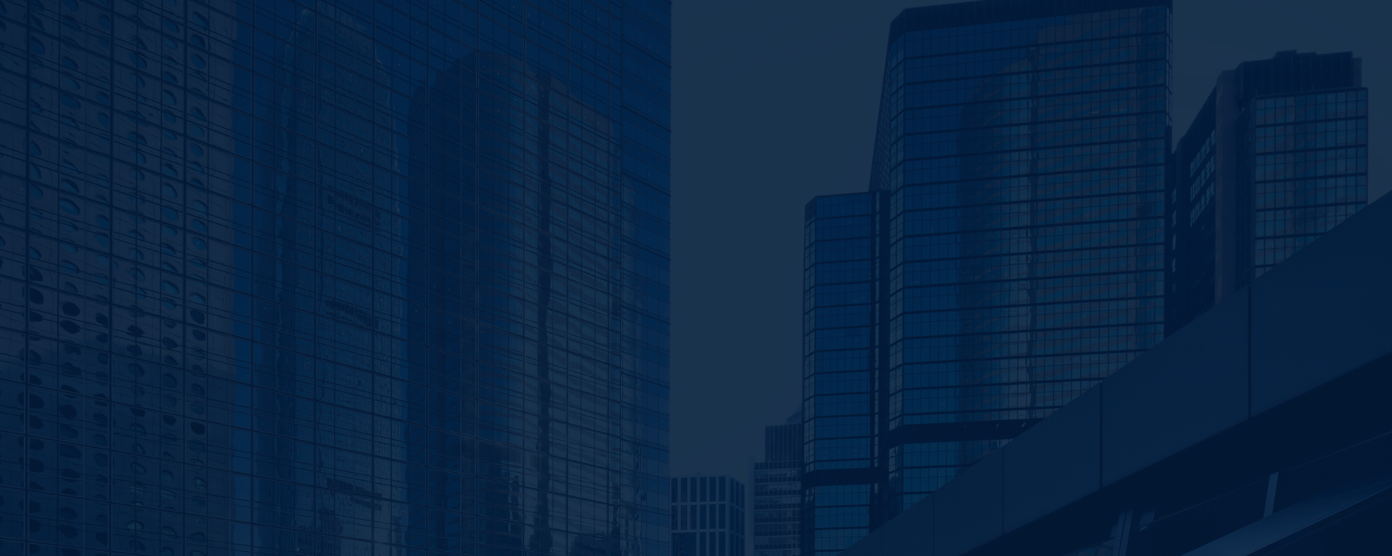 City skyline made up of blue skyscraper buildings.