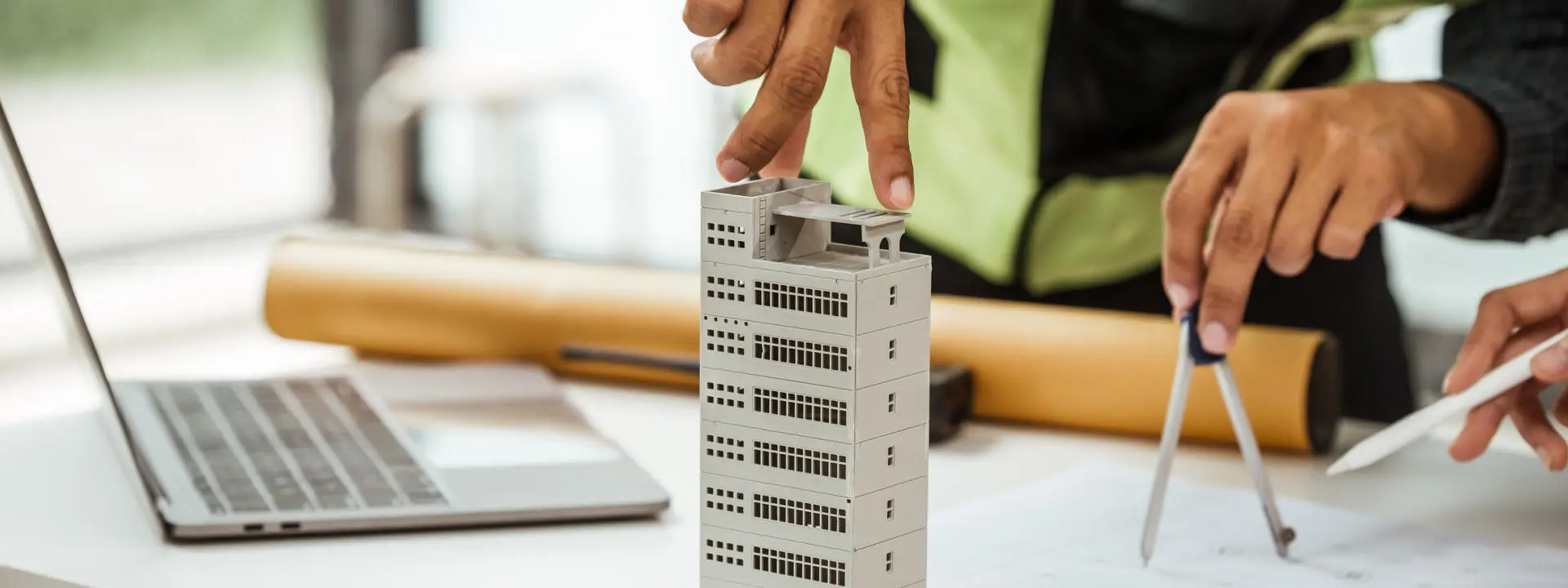 A professional working in a dynamic office dealing with construction