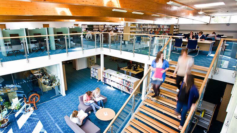Library with stairs and glass railings