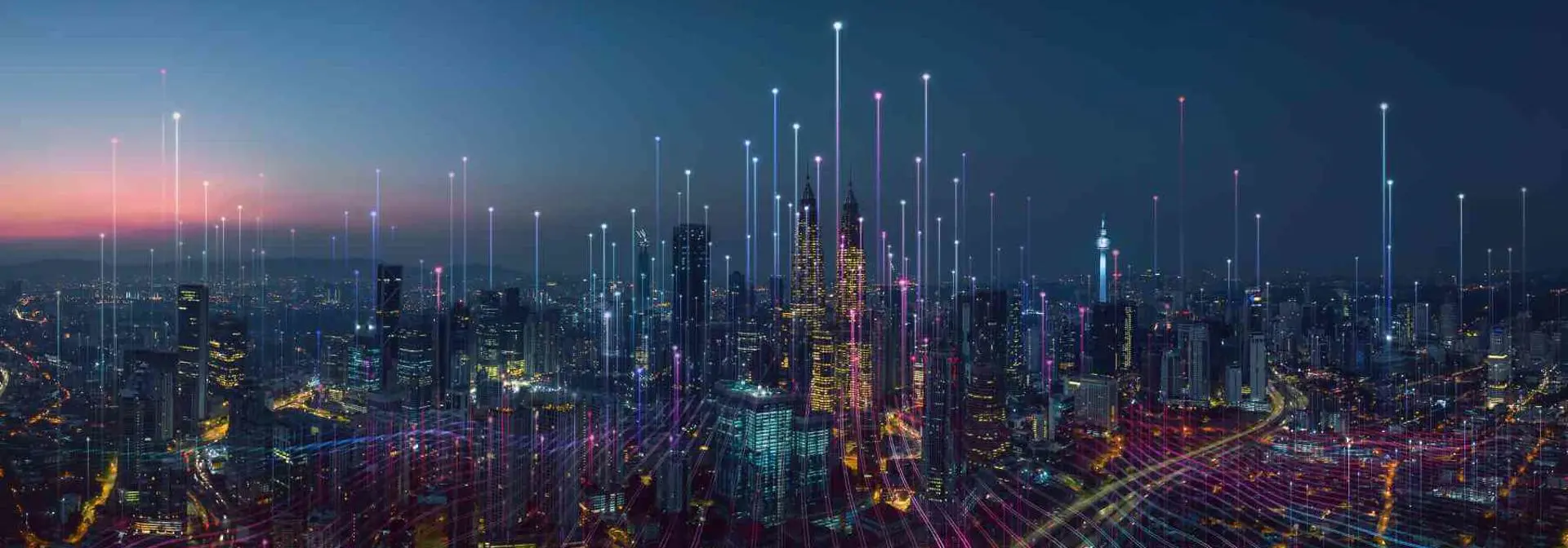 Dubai skyline at night with superimpsoed beams of light shooting upwards into sky
