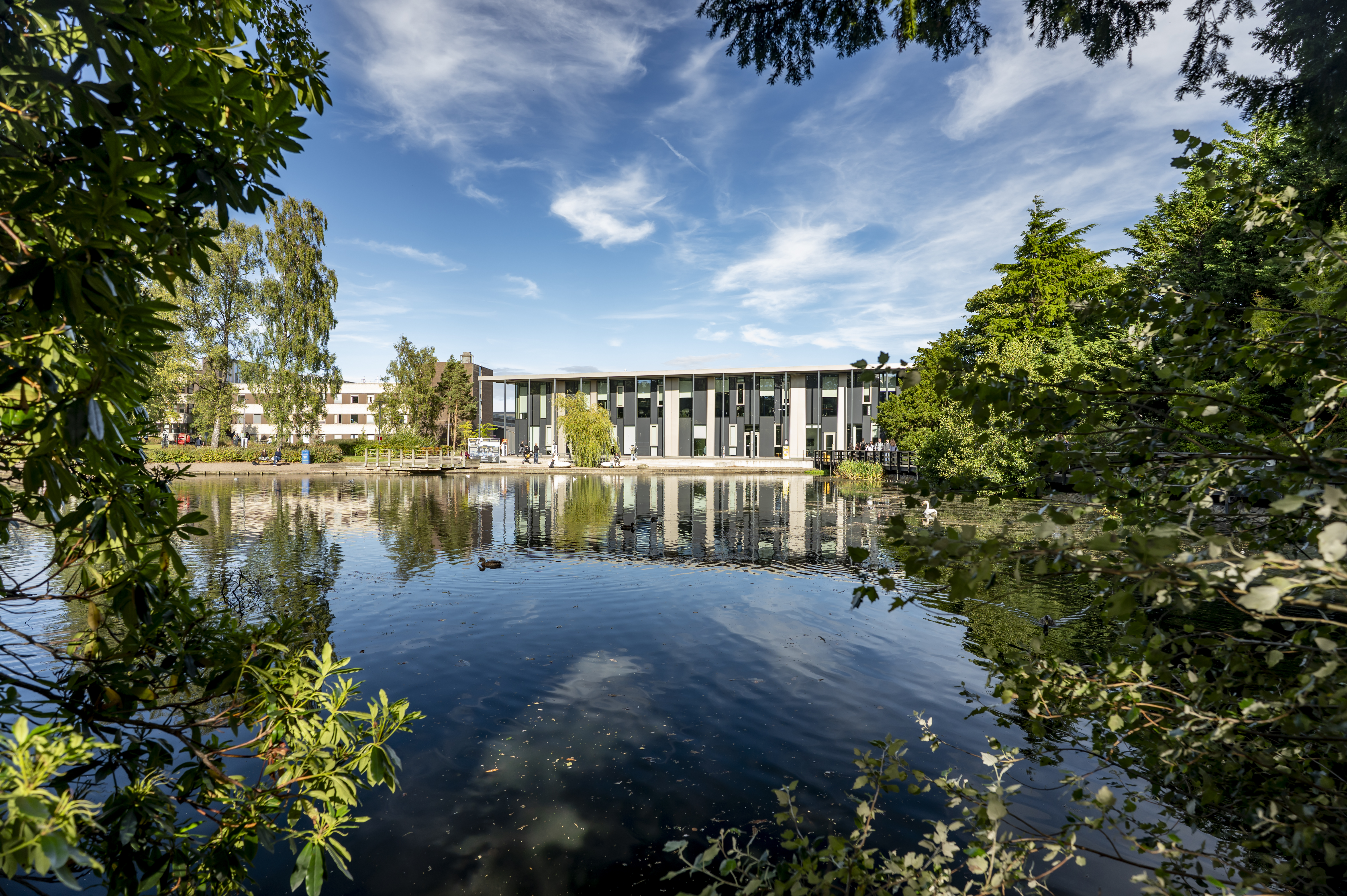 Shot of Heriot-Watt GRID building, with loch in the foreground