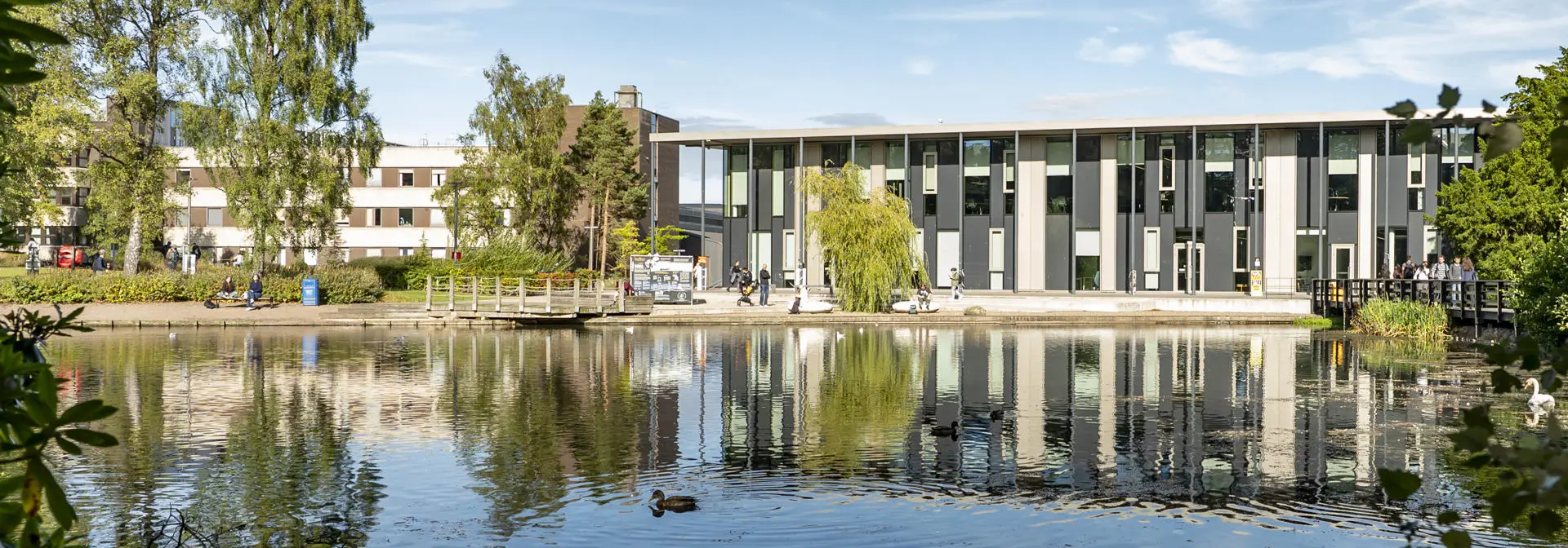 Shot of Heriot-Watt GRID building, with loch in the foreground