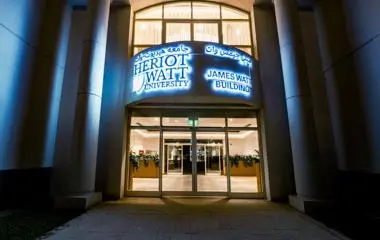 entrance of a building with Heriot-watt logo and building name James Watt Building