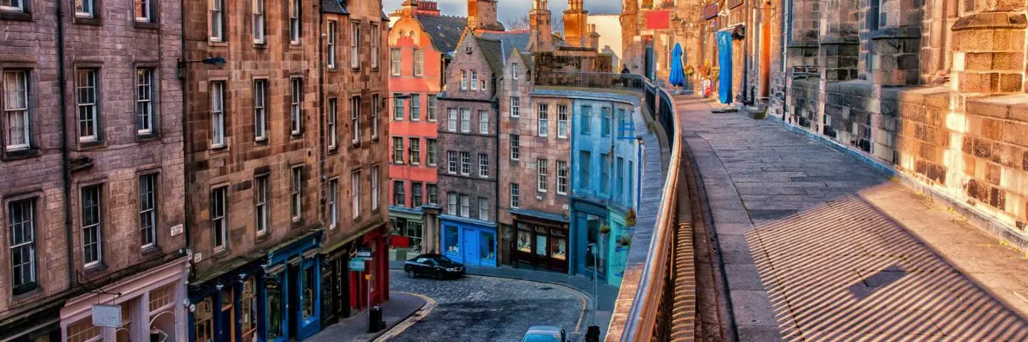 Victoria Street in Edinburgh at sunset with no people.
