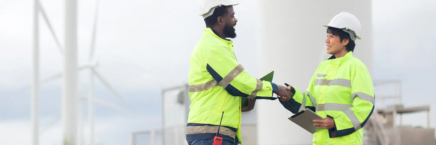 Two engineers at a windfarm