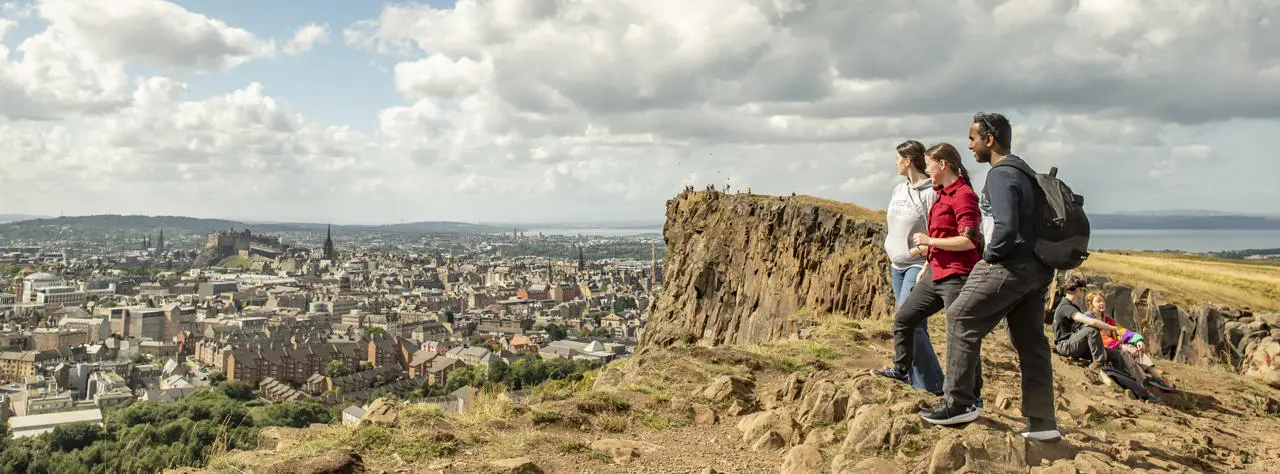 Students overlooking Edinburgh from Salisbury Crags.