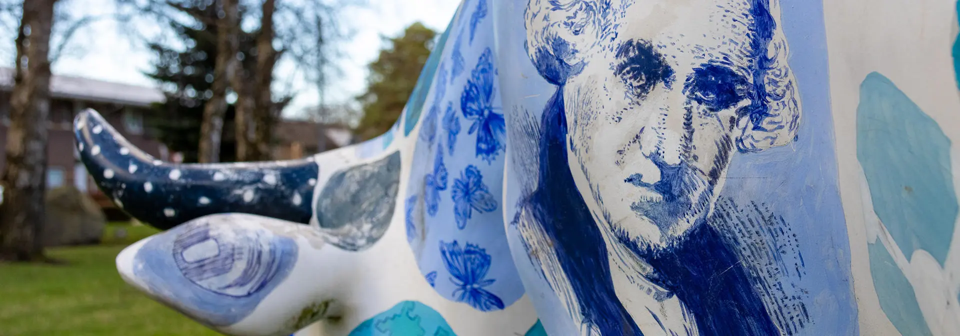 Illustration of James Watt's head on the 'Watt a nice cow' statue at the Edinburgh Campus.