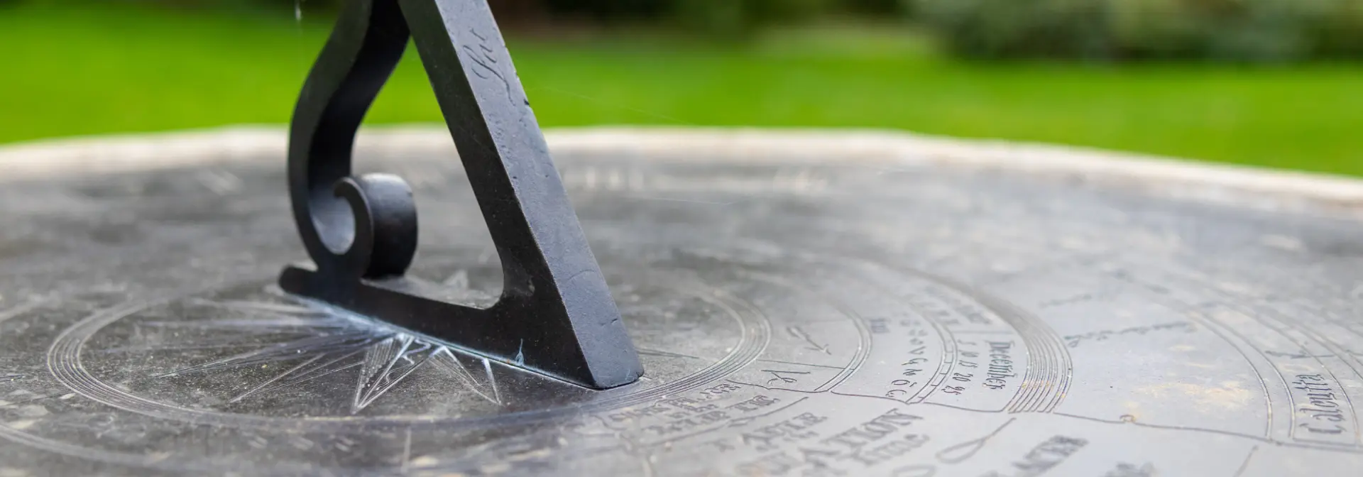 Close up picture of a sun dial on the Edinburgh Heriot-Watt campus.