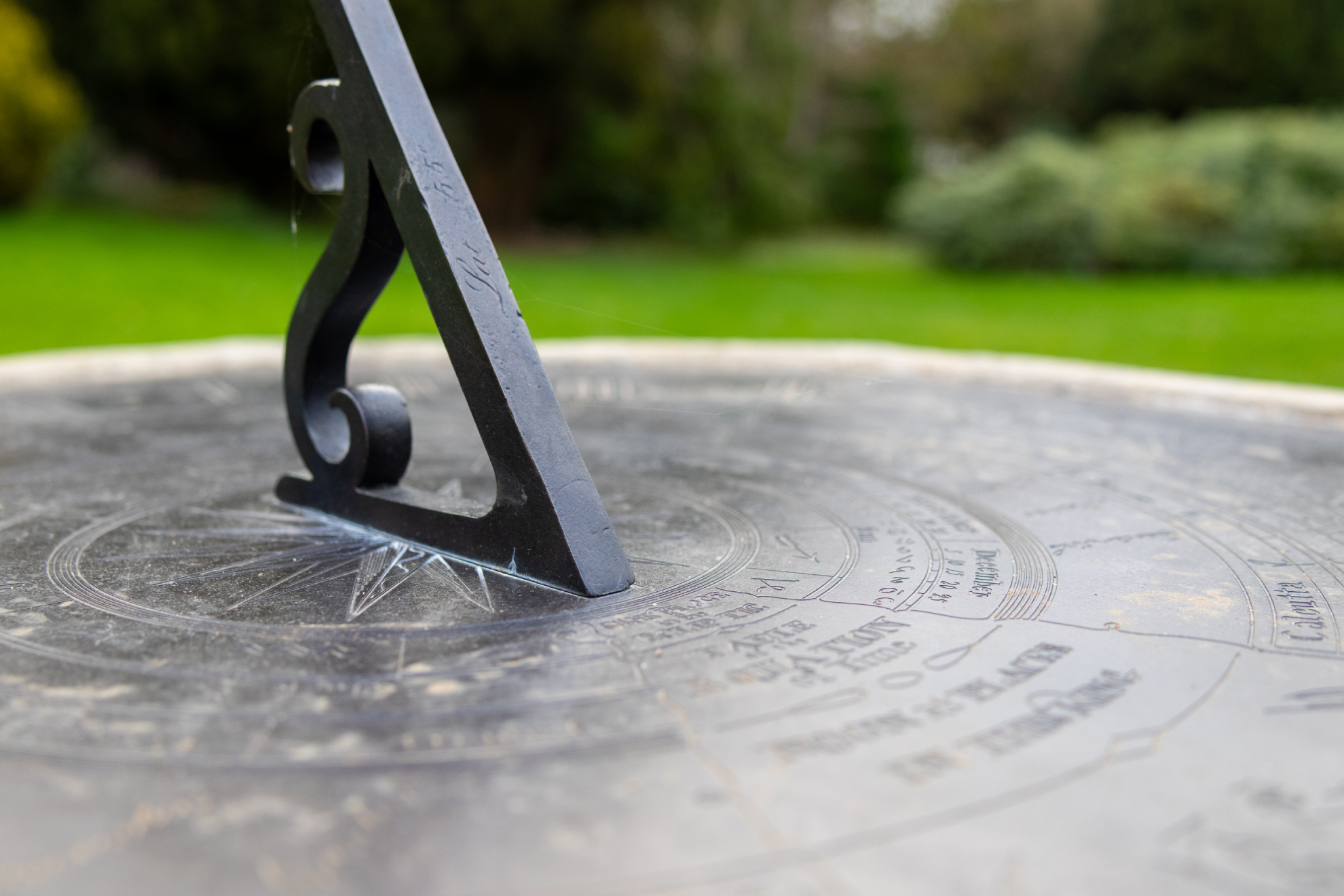 Close up picture of a sun dial on the Edinburgh Heriot-Watt campus.
