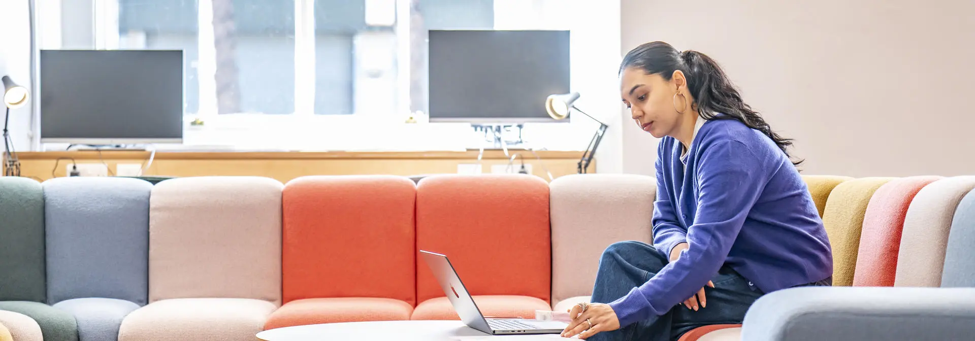 A girl studying with a laptop