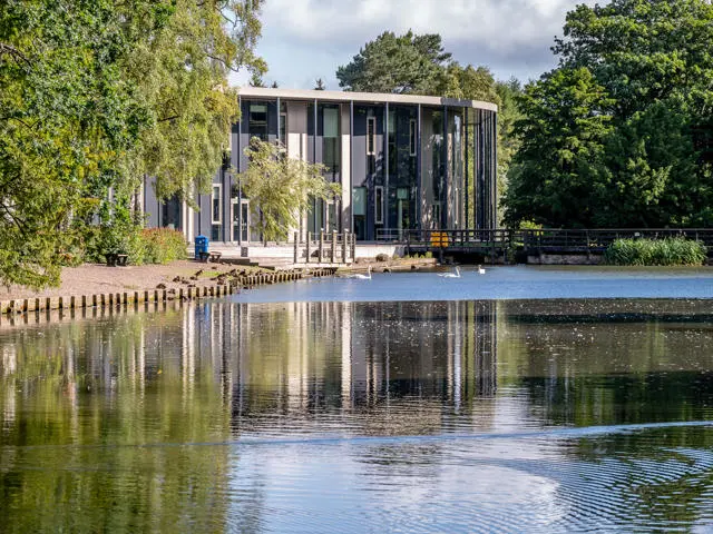 A loch beside a building.