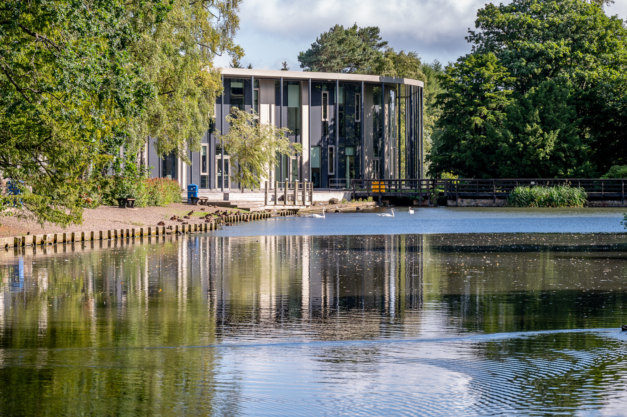 A loch beside a building.