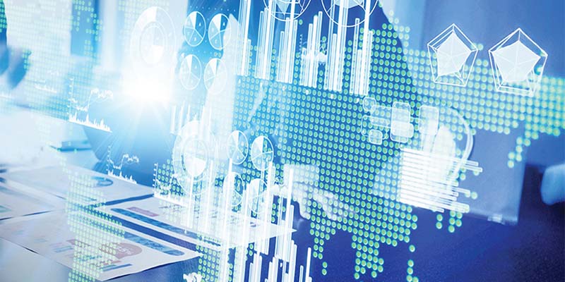Financial charts superimposed on a map of the world