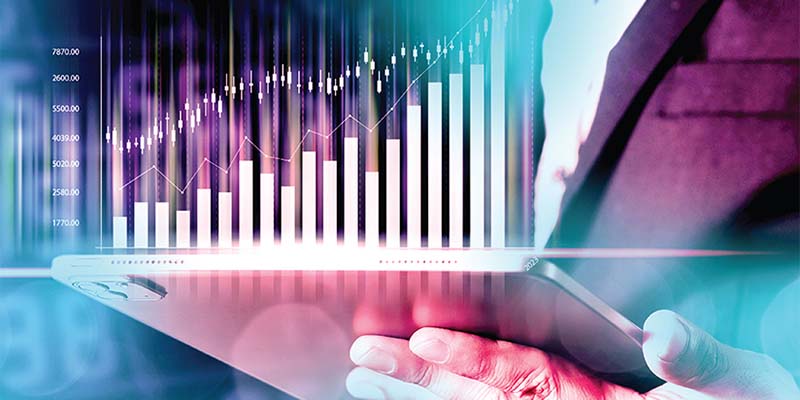 Digital depiction of a progress chart above a tablet computer