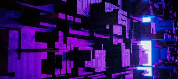 A complex network of computer chips illuminated in purple light