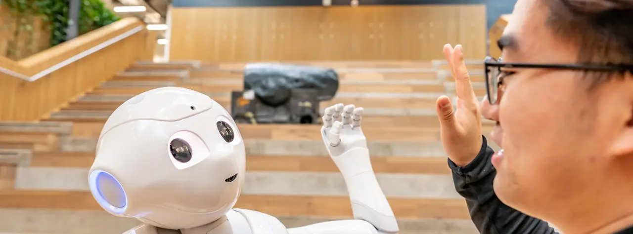 robot giving a human a high-five