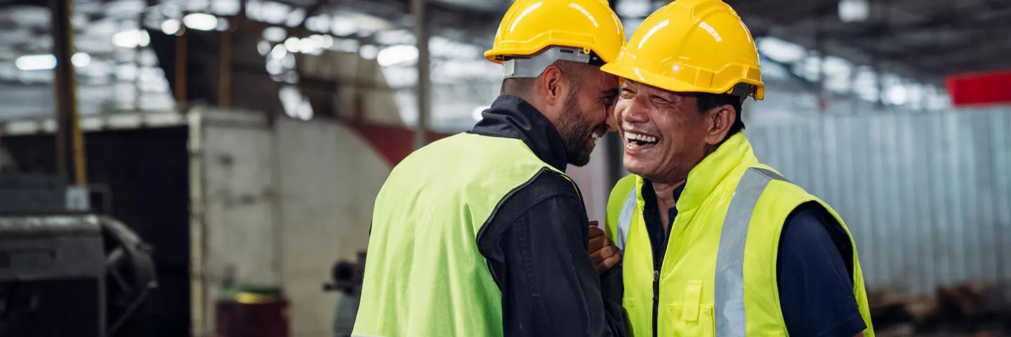 Two industry workers shaking hands