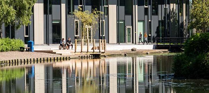 The GRID building seen across the loch, Edinburgh Campus