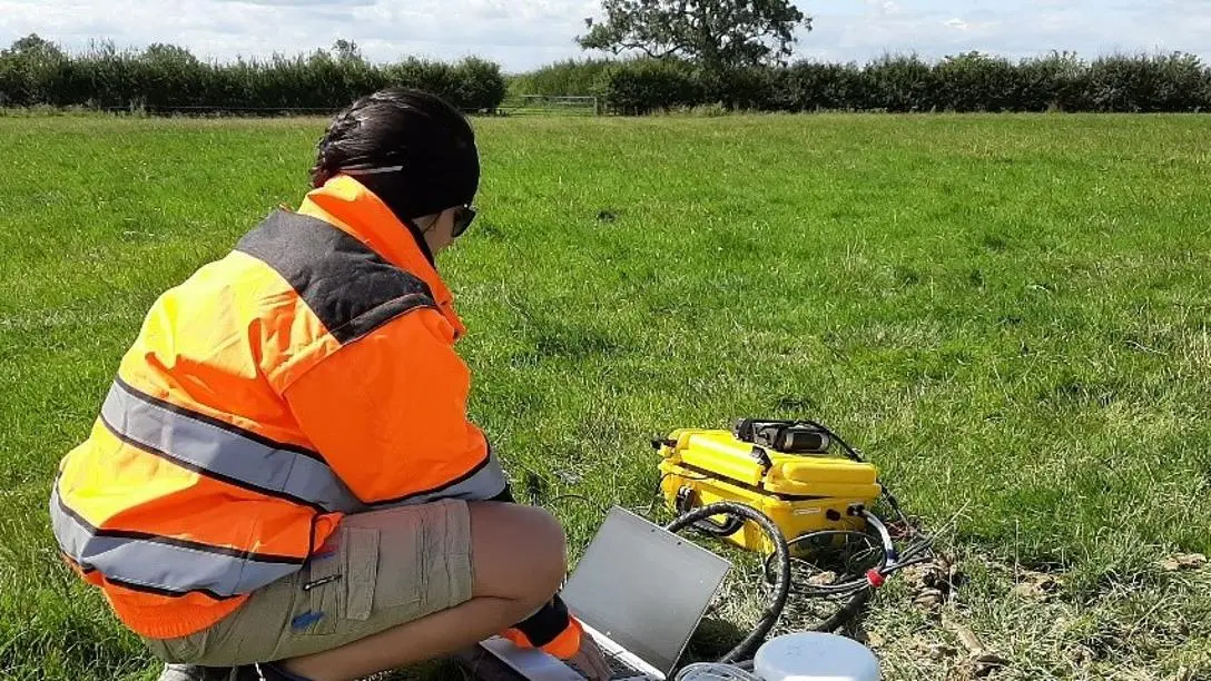 PhD student Paula Gonzalez testing soil for methane leaks