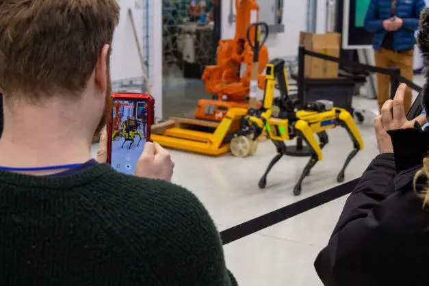 A member of staff at the National Robotarium open day for Heriot-Watt staff