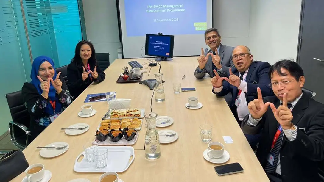 Malaysia Government officers attending the JPA-BMCC Management Development Programme seated in a meeting room