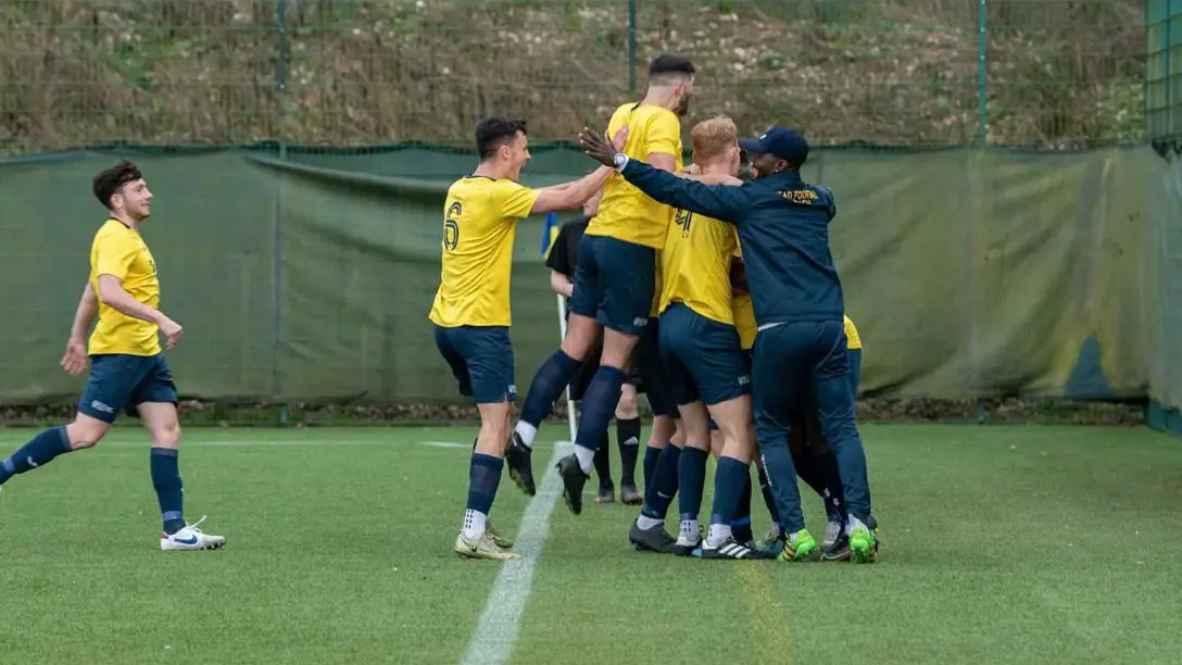 Heriot-Watt University FC celebrating at the Leeds Beckett game