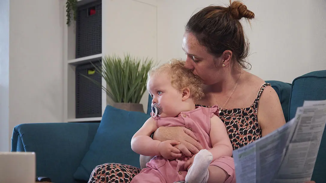 Mother and child worried about bills