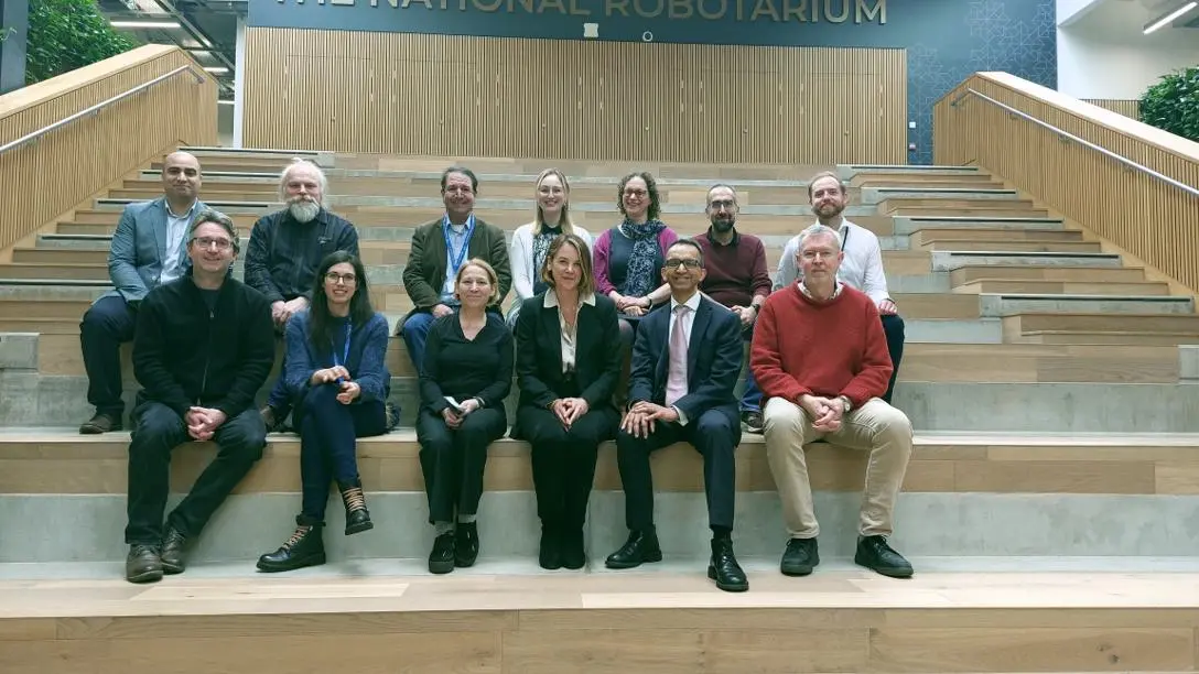 NHS Chief Exec Caroline Lamb with researchers at the National Robotarium