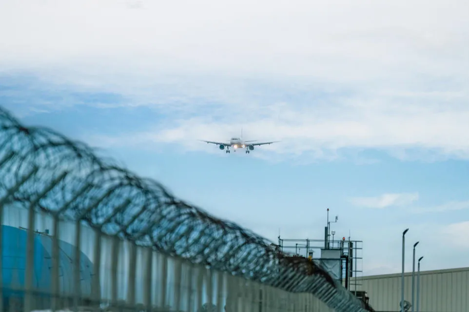 An aircraft approaching a runway. 