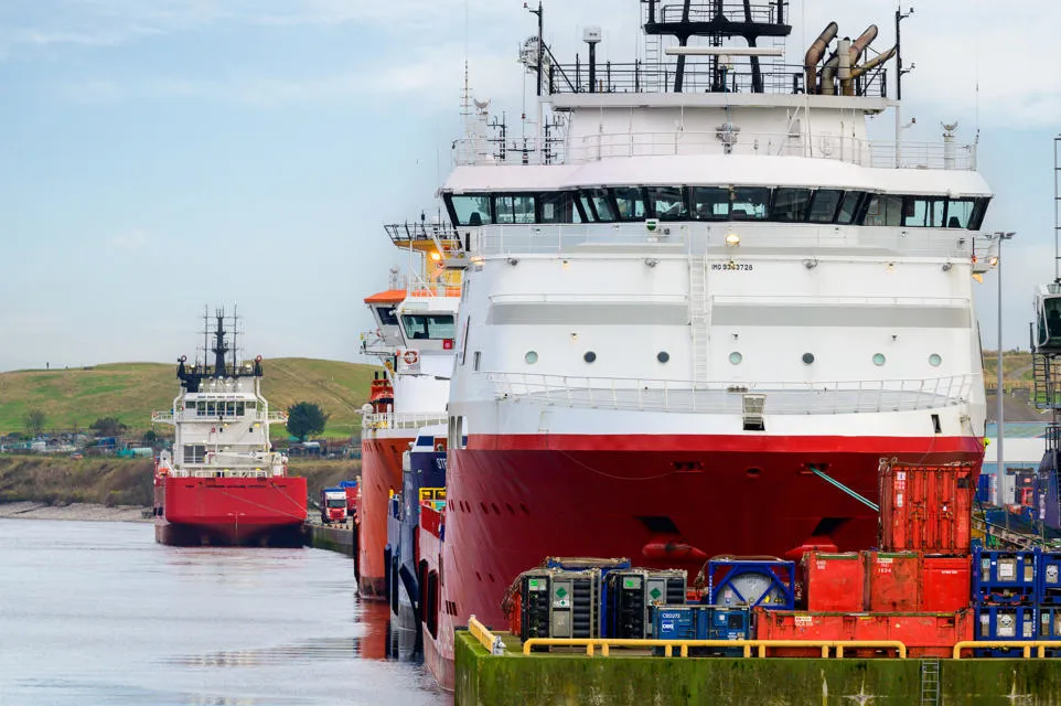 Ships docked at a harbour. 