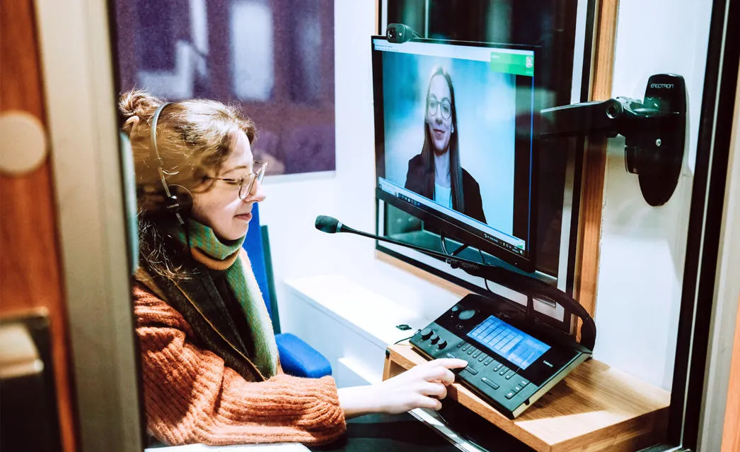 A translation underway in a language booth at Heriot-Watt’s School of Social Sciences. A translation underway in a language booth at Heriot-Watt’s School of Social Sciences.