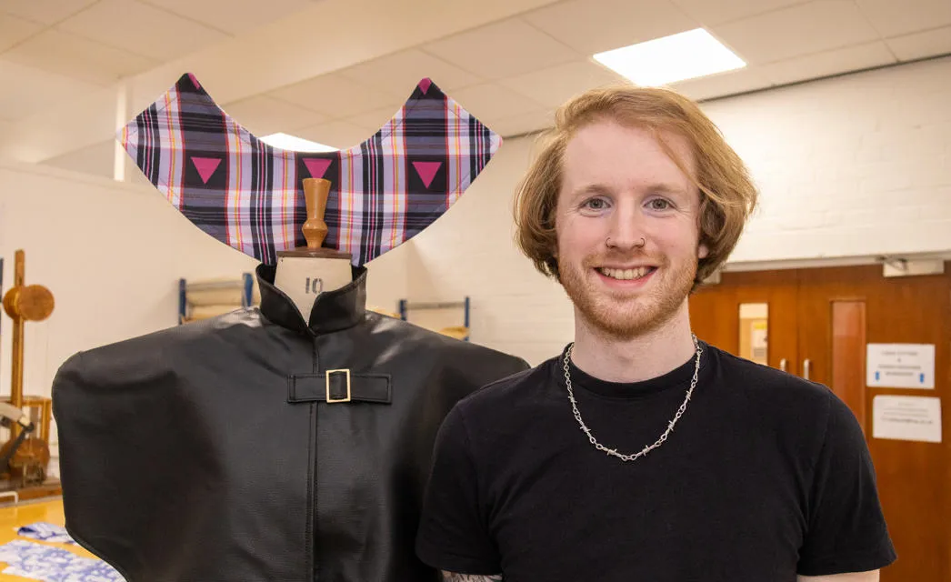 Craig Taylor with his leather and tartan cape. 