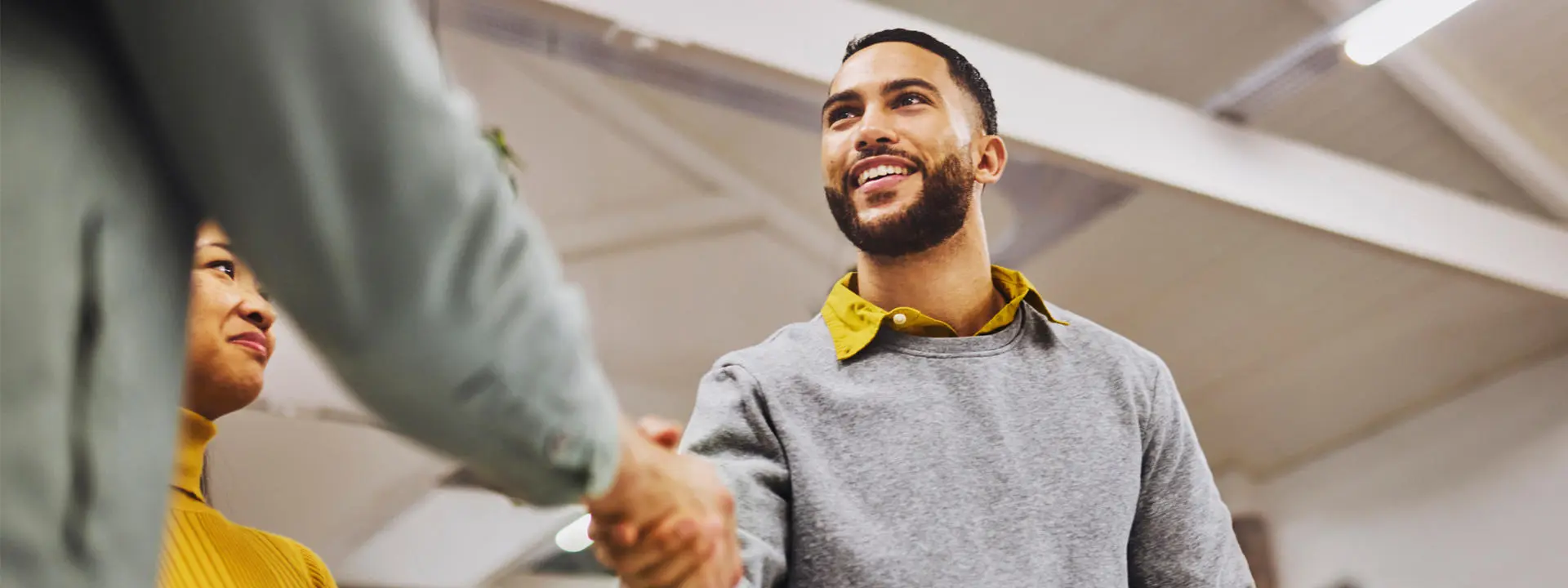 Shaking hands. Photo by Layla Bird.