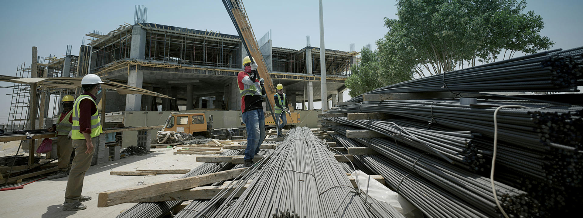 Work on a construction site. Photo by Glenov Brankovic on Unsplash.