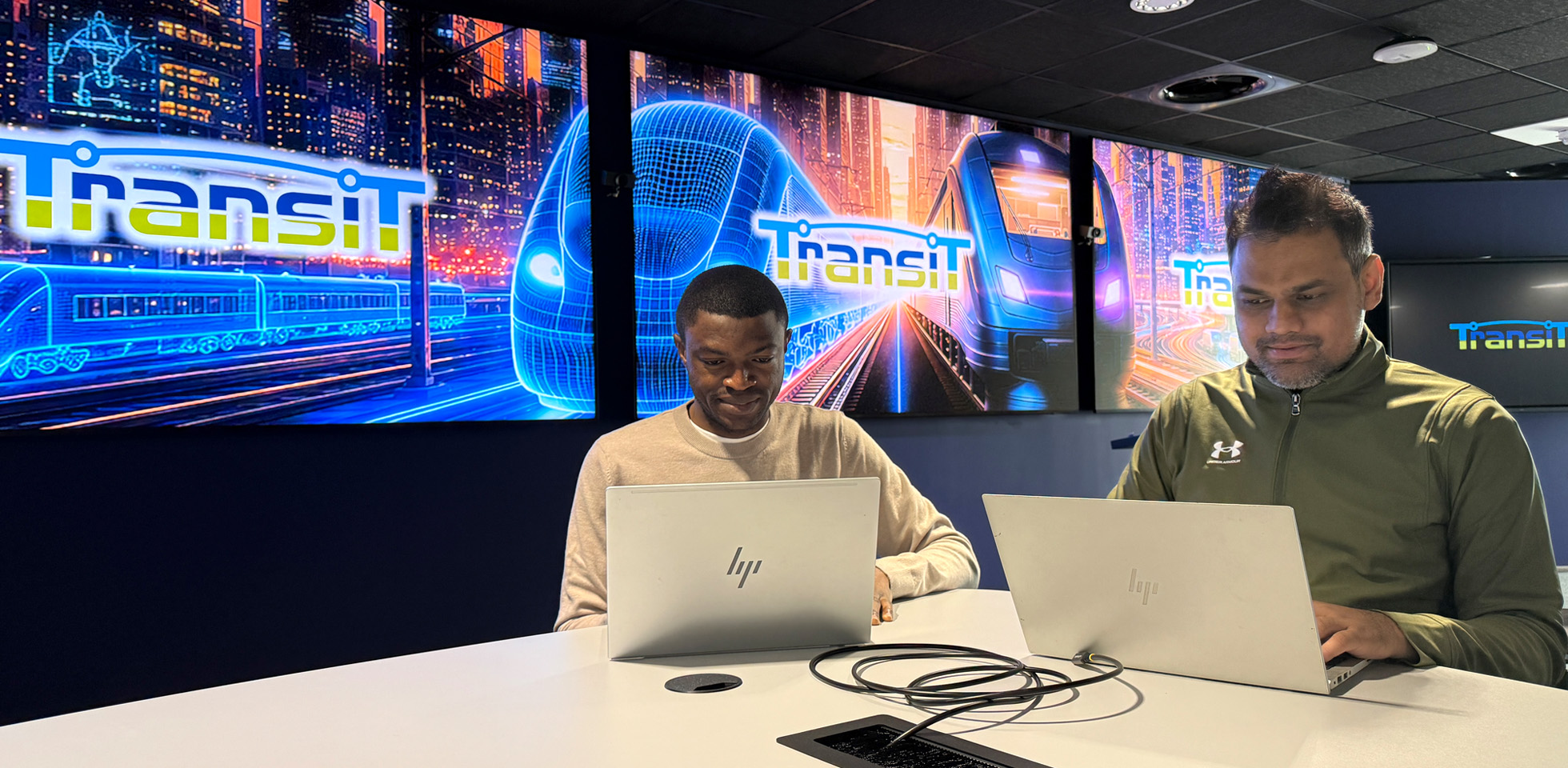TransiT research students Yakubu Isah (left) and Mustafeez Khanzada in the research hub’s Transport Intelligence Lab. 