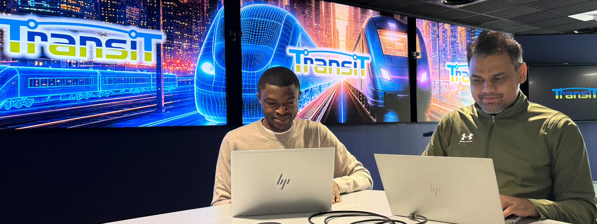 TransiT research students Yakubu Isah (left) and Mustafeez Khanzada in the research hub’s Transport Intelligence Lab.