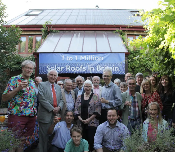 In 2016, Professor Roaf held the 'one to one million' party, celebrating the one millionth UK property to be fitted with solar panels. Shot of a gathering celebrating the one millionth property fitted with solar panels.