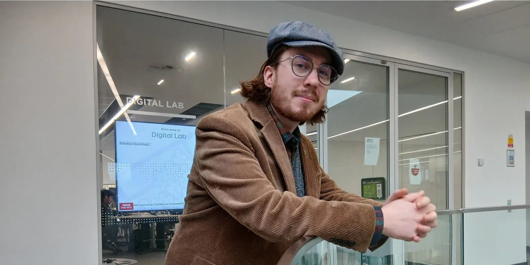 Student Sandy standing looking at camera