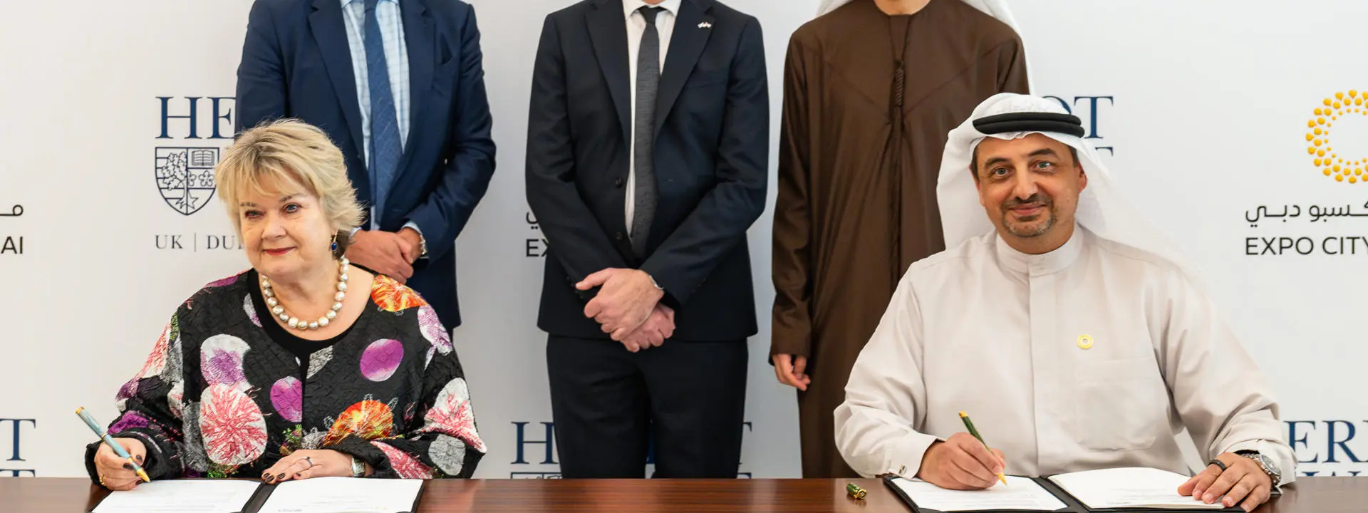 Image shows the key participants at the signing of the MOU in the UAE.