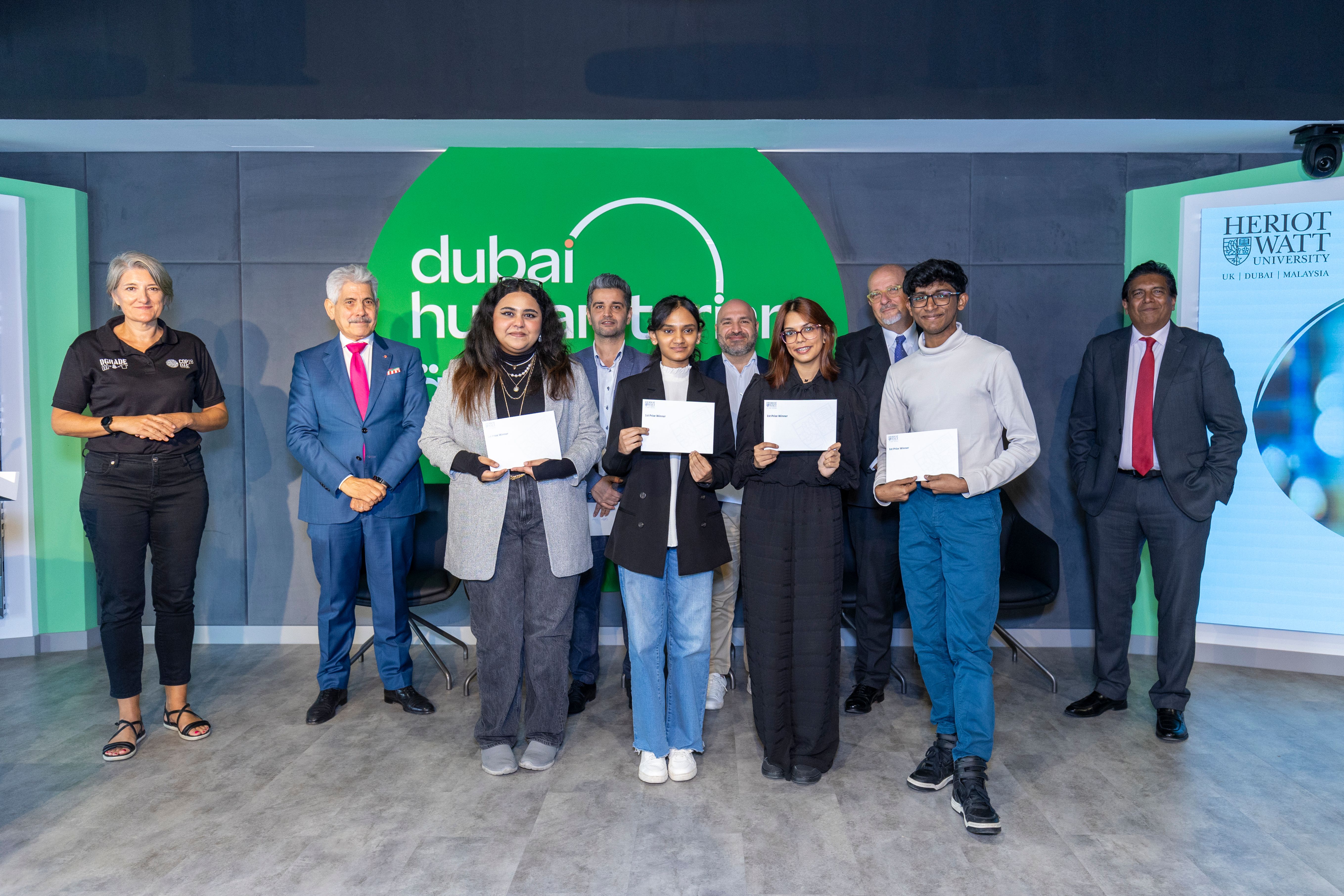 students holding awards