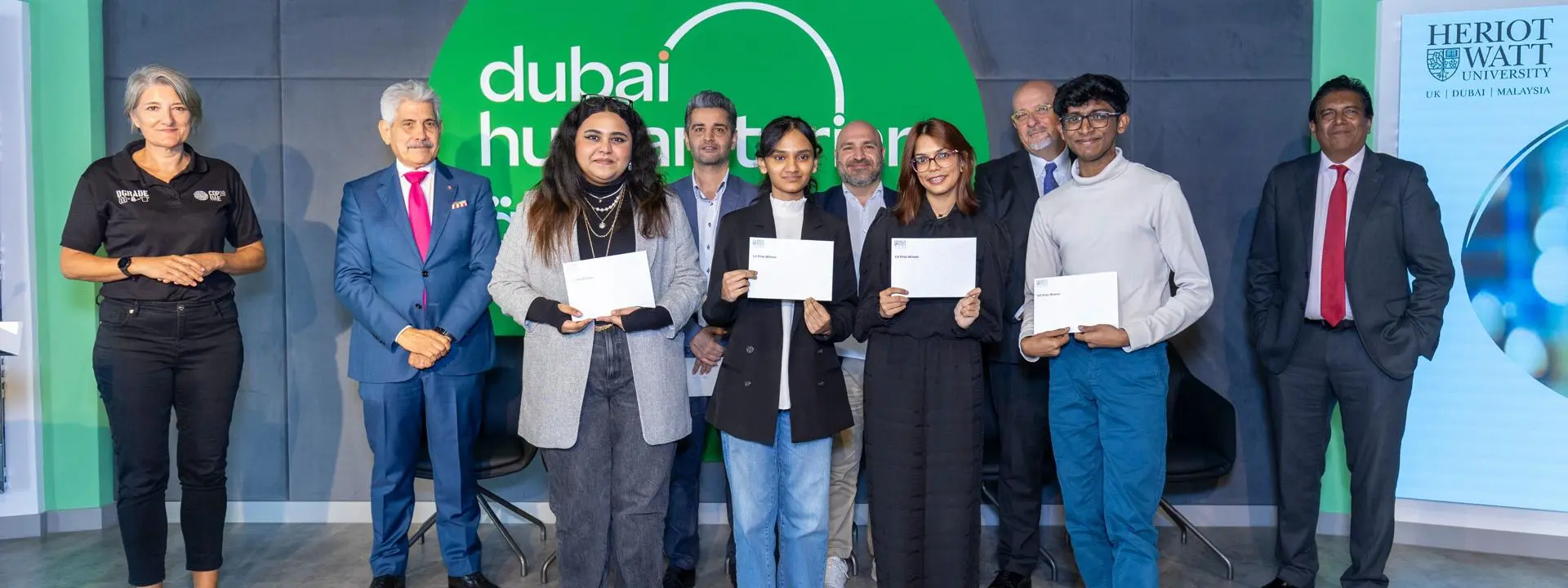 students holding awards